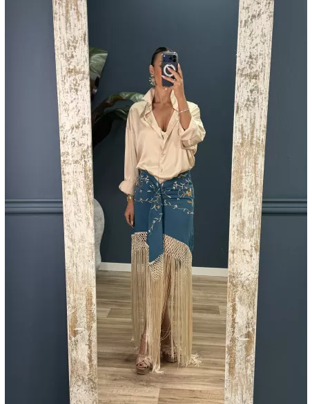 Falda azul borda con flecos