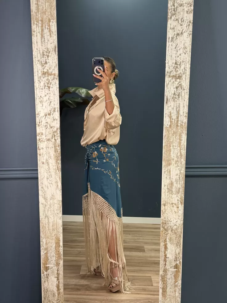 Falda azul borda con flecos
