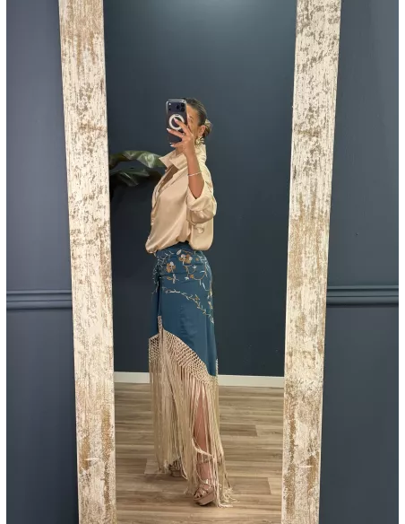 Falda azul borda con flecos