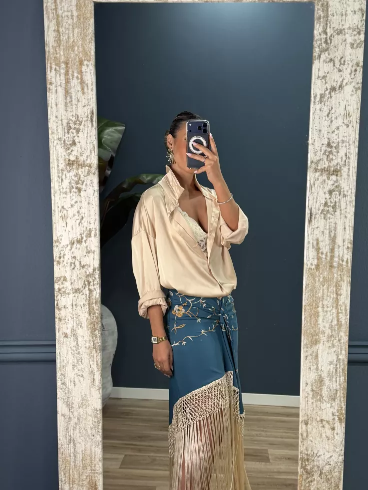 Falda azul borda con flecos