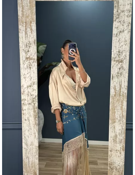 Falda azul borda con flecos