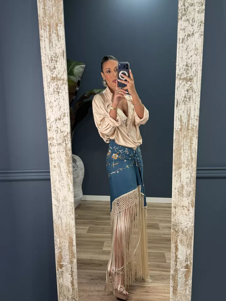 Falda azul borda con flecos