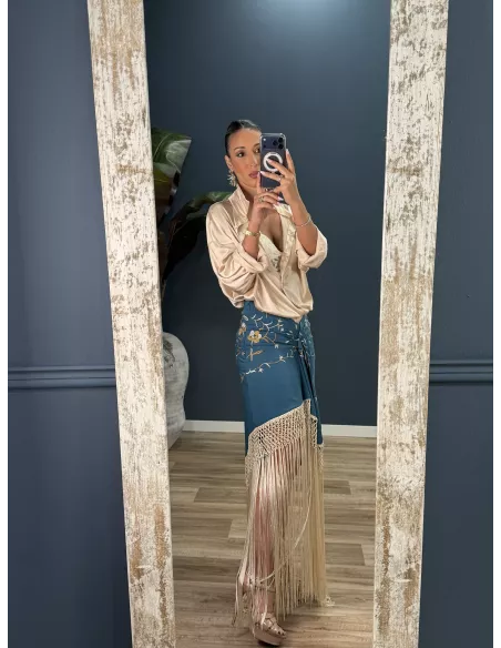 Falda azul borda con flecos