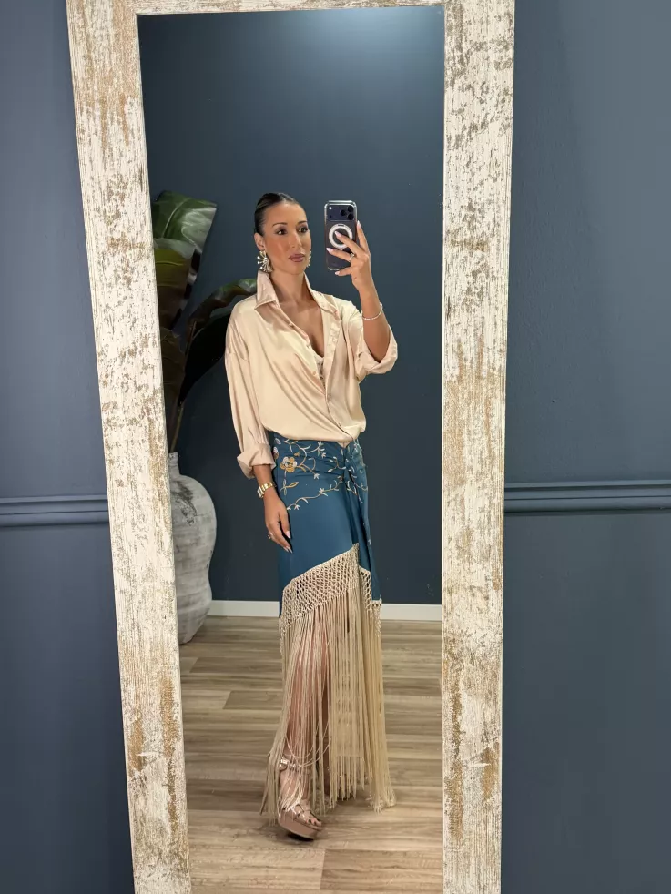 Falda azul borda con flecos