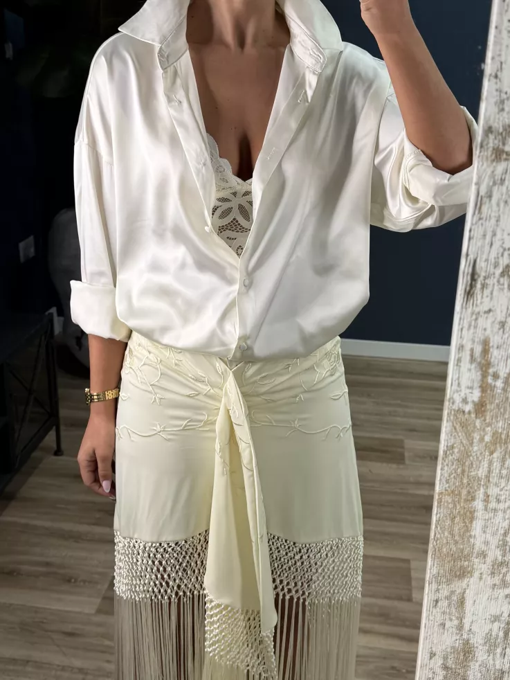 Falda blanca borda con flecos