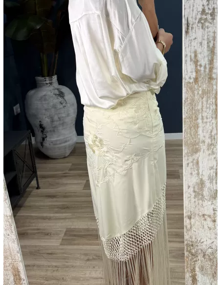 Falda blanca borda con flecos