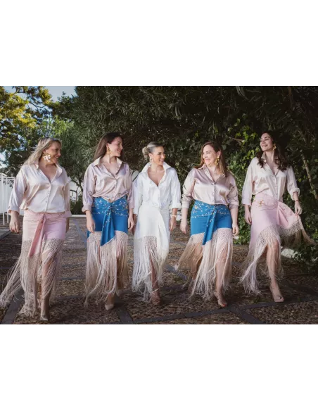 Falda blanca borda con flecos