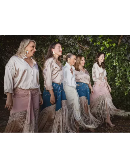 Falda blanca borda con flecos