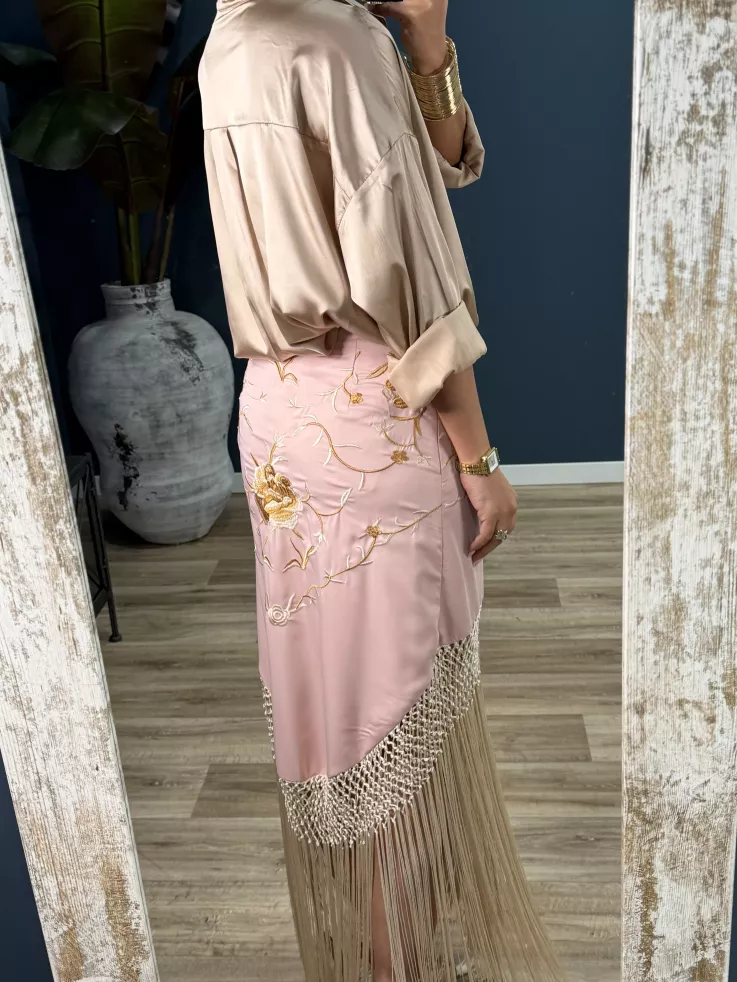 Falda rosa borda con flecos