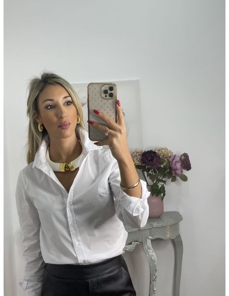 Colgante colmillos con engarce dorado