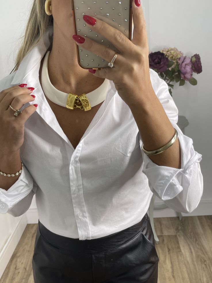 Colgante colmillos con engarce dorado