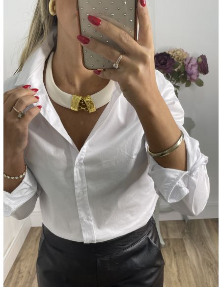 Colgante colmillos con engarce dorado