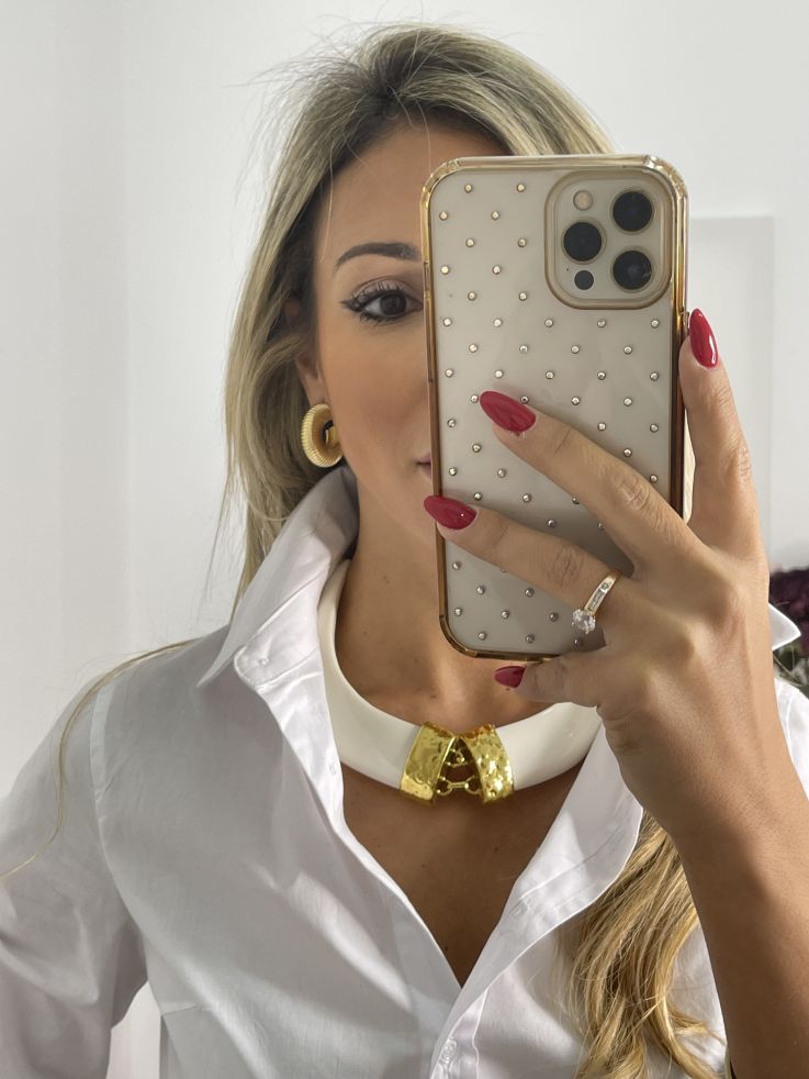 Colgante colmillos con engarce dorado