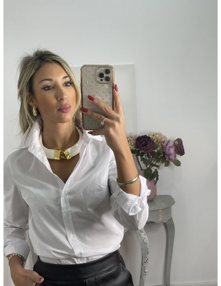 Colgante colmillos con engarce dorado