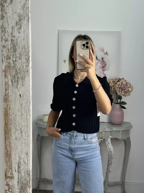 Jersey cuello polo trenzado negro