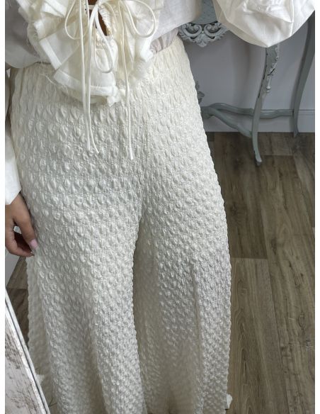 Pantalón tejido punto rugoso hueso