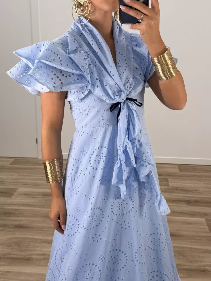 Bata perforada azul