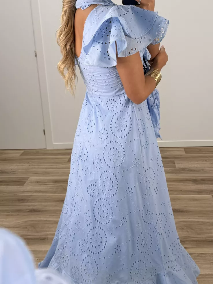 Bata perforada azul