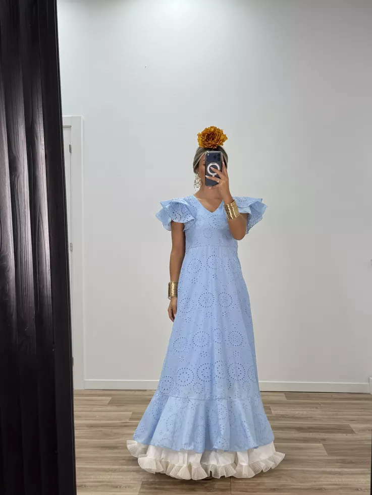 Bata perforada azul