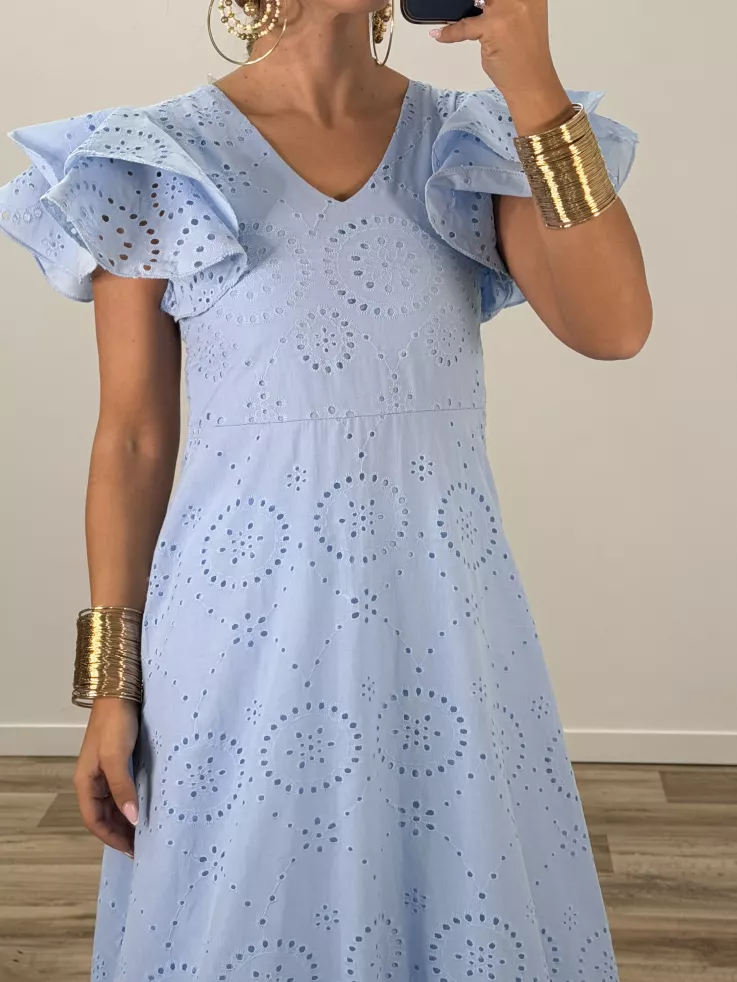 Bata perforada azul