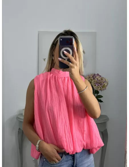 Blusa rosa fluorescente lazada espalda al aire