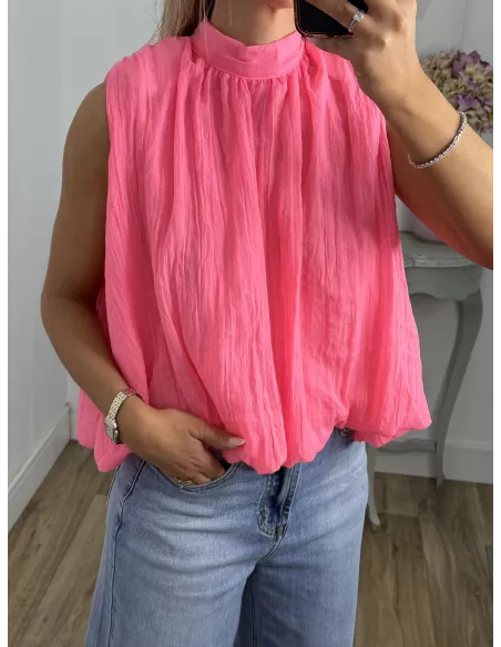Blusa rosa fluorescente lazada espalda al aire