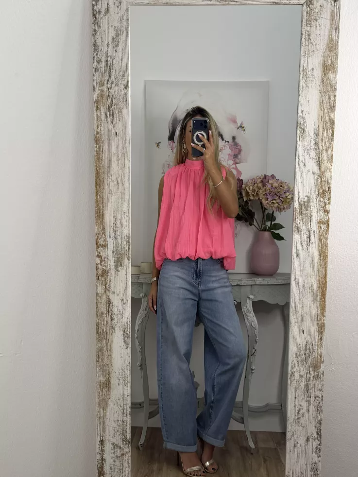Blusa rosa fluorescente lazada espalda al aire