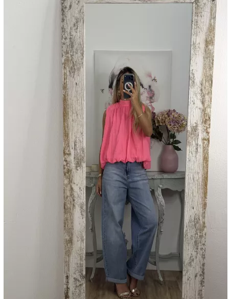 Blusa rosa fluorescente lazada espalda al aire
