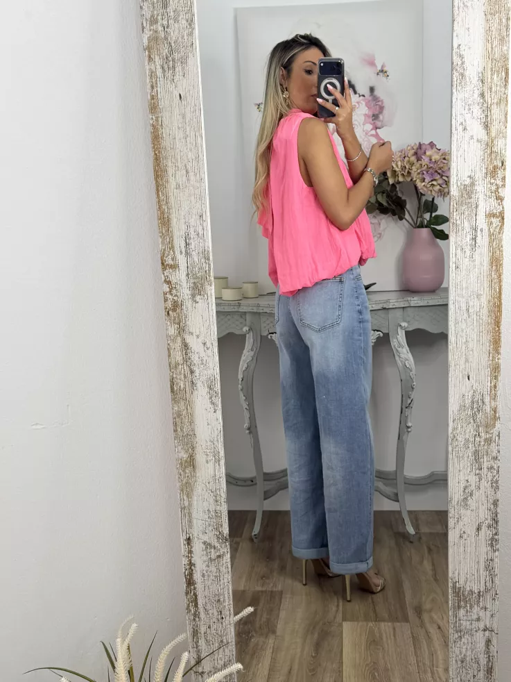 Blusa rosa fluorescente lazada espalda al aire
