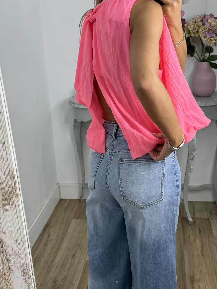 Blusa rosa fluorescente lazada espalda al aire