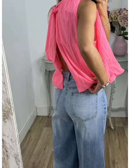 Blusa rosa fluorescente lazada espalda al aire