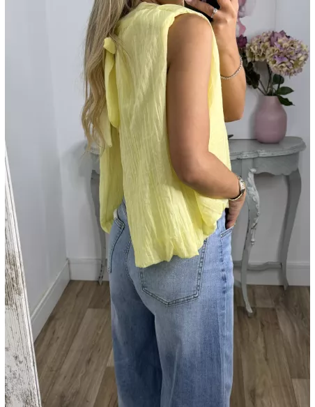 Blusa amarilla fluorescente lazada espalda al aire