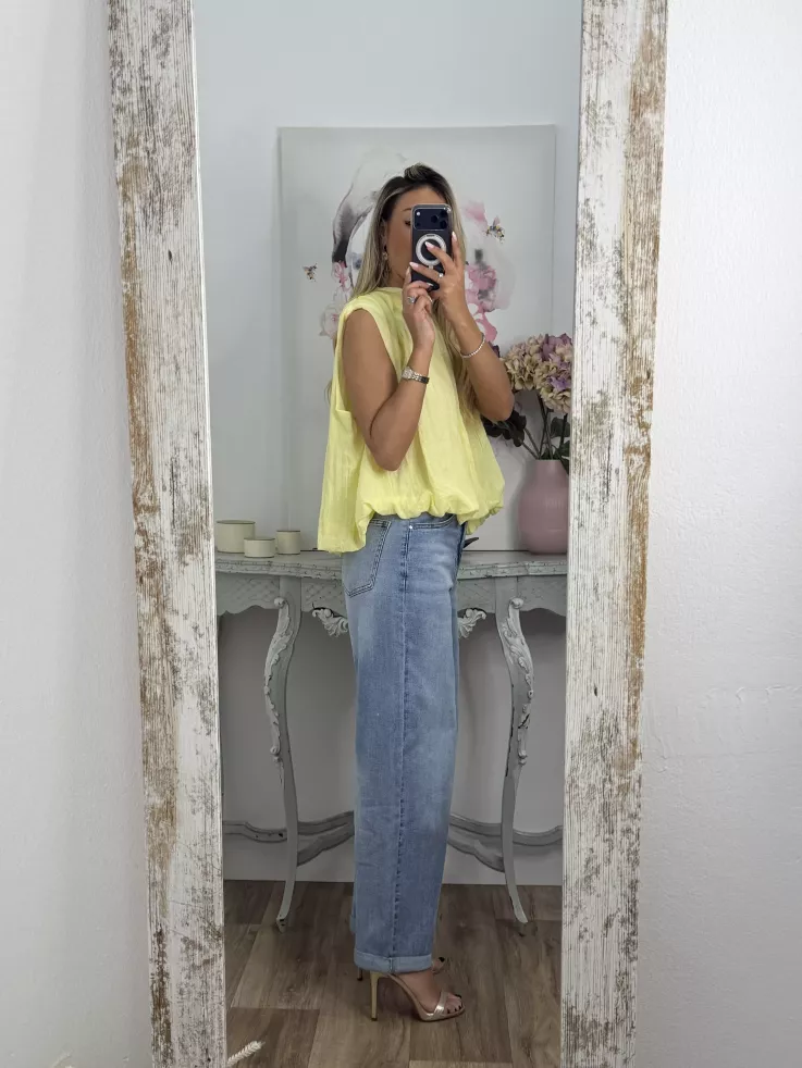 Blusa amarilla fluorescente lazada espalda al aire
