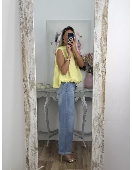 Blusa amarilla fluorescente lazada espalda al aire