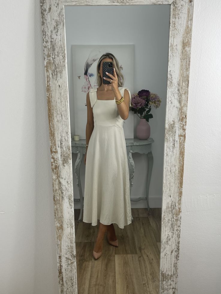Vestido beige con tiranta lazo