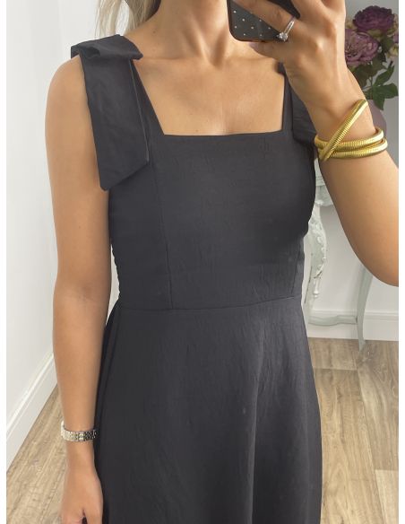Vestido negro con tiranta lazo