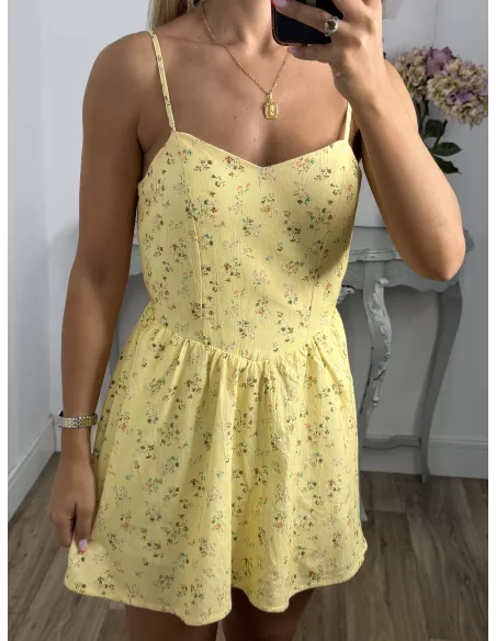 Mono Brasilia amarillo de flores