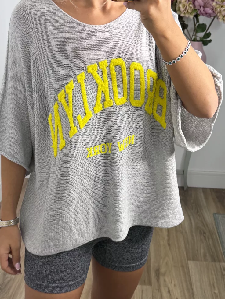 Jersey gris letras flúor amarillo