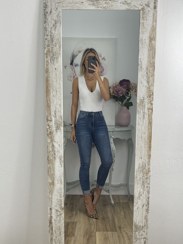 Jeans denim claro etiqueta roja