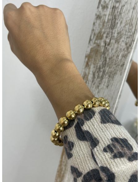 Pulsera bola dorada