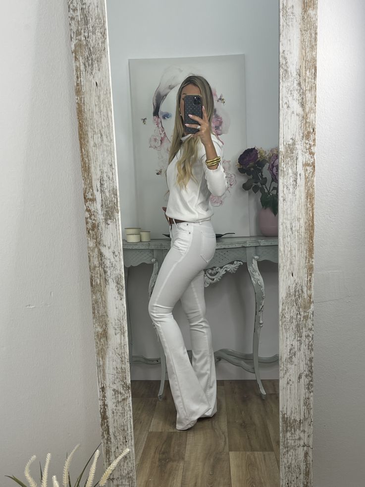 Jeans campanas de tiro bajo blanco