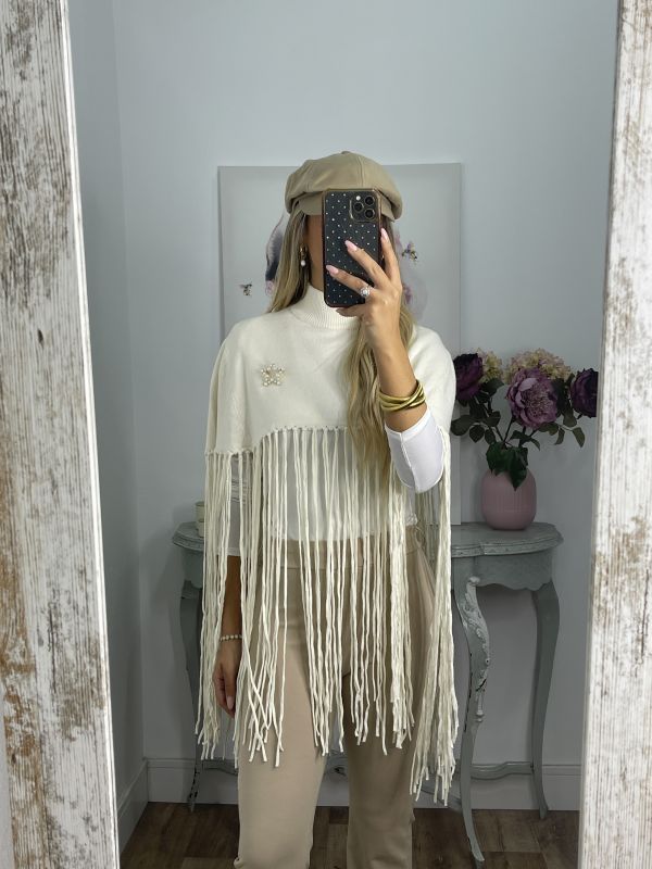 Poncho flecos hueso