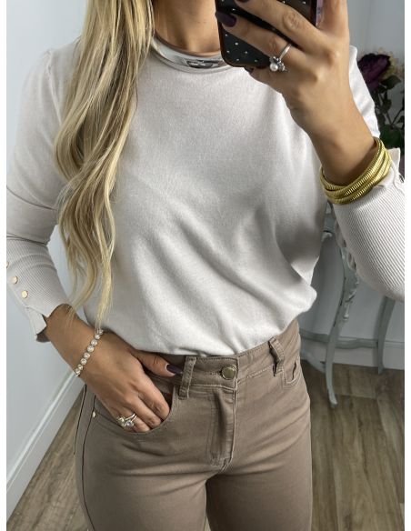 Jersey basic beige con botones en el puño