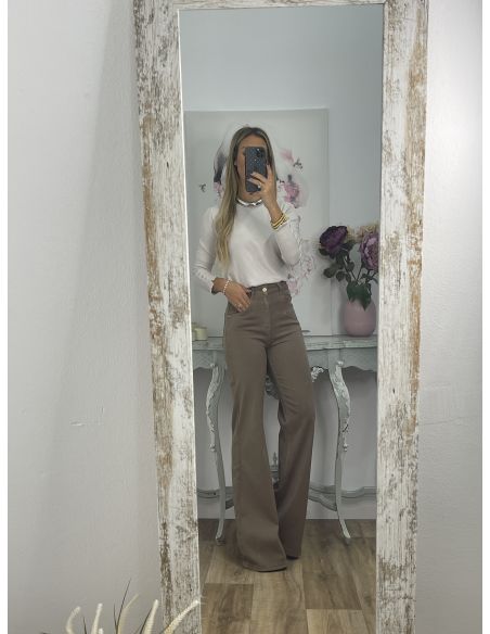 Jersey basic beige con botones en el puño