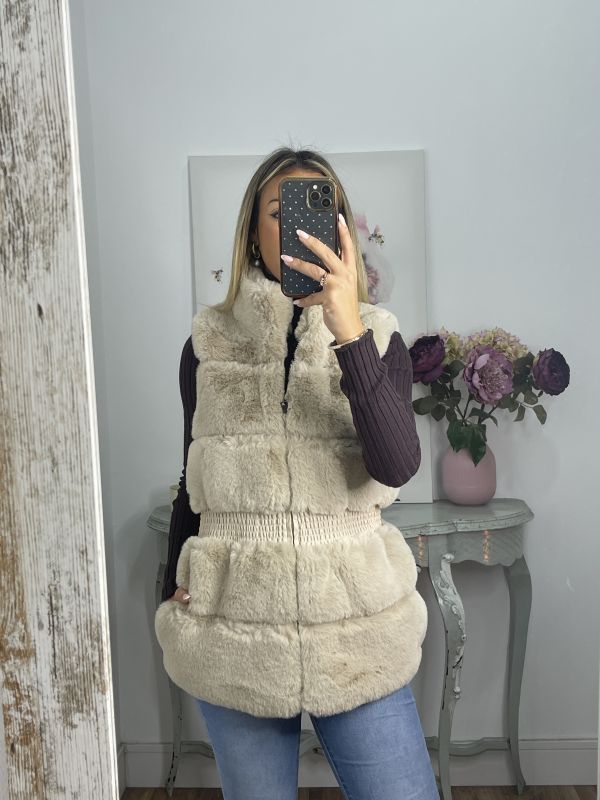 Chaleco beige con frunce en la cintura