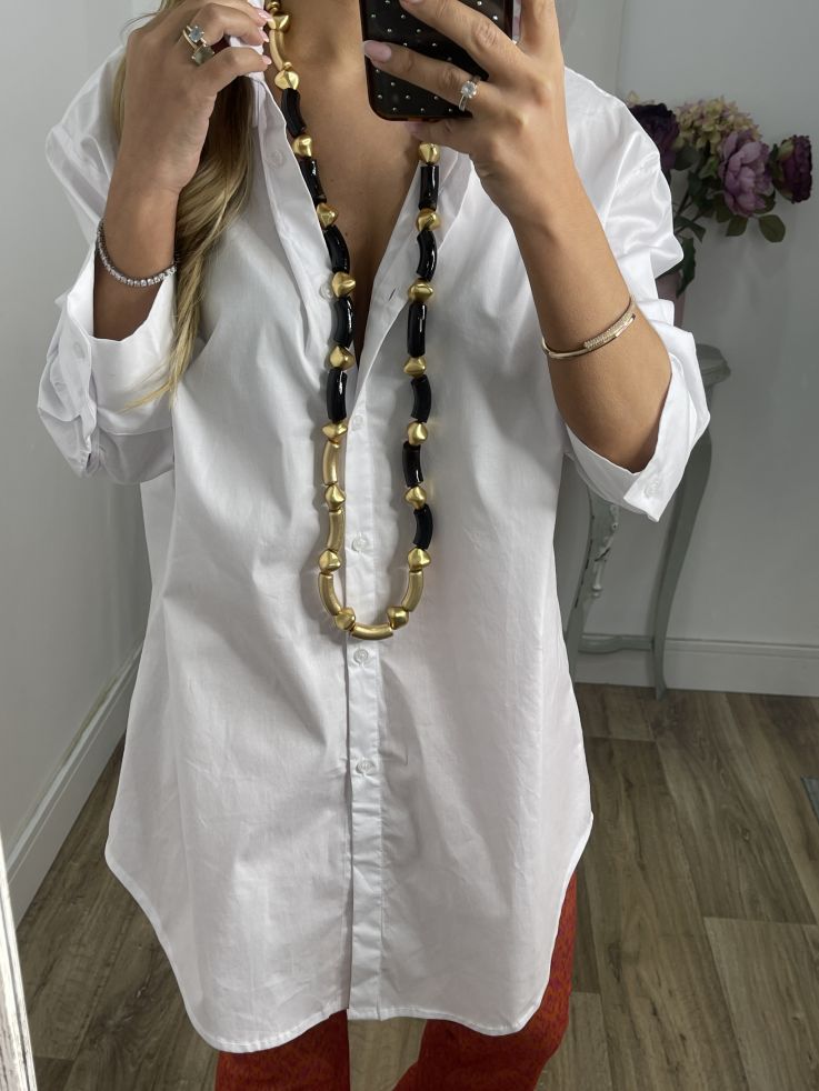 Colgante negro y dorado