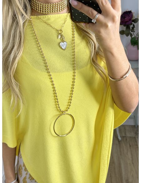 Poncho de punto amarillo