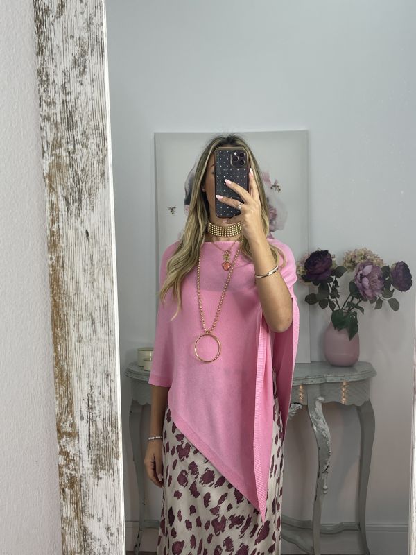 Poncho de punto rosa