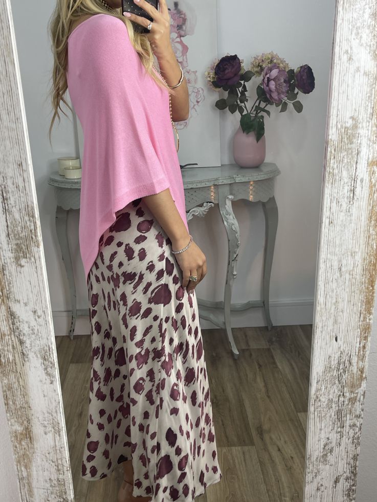 Poncho de punto rosa